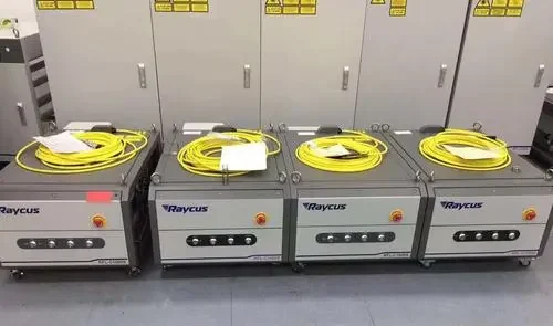 Multiple Raycus fiber laser sources in stock for laser cutter machine assembly.