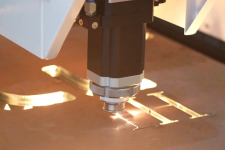 MAGICK laser cutting machine performing a real material cutting test before delivery