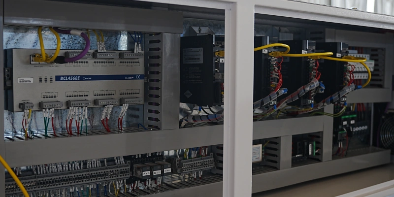 MK-ST fiber laser cutting machine electrical control cabinet with organized wiring for easy inspection and maintenance