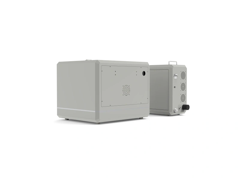 Rear view of the MK-DC laser cutter with ventilation panels and equipment connections